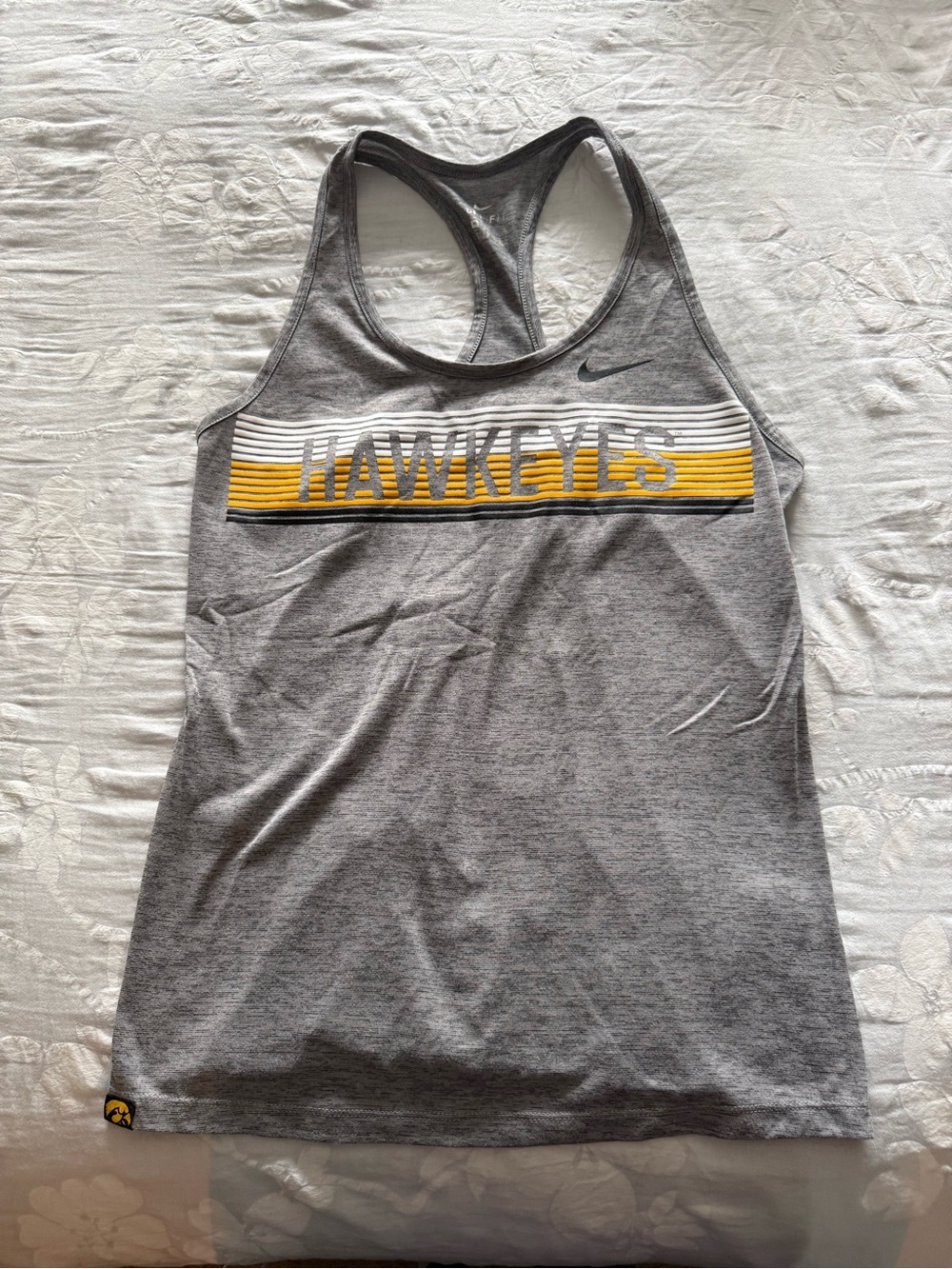 Nike UIowa Women's Grey Racerback Tank with Yellow Hawkeyes Stripe